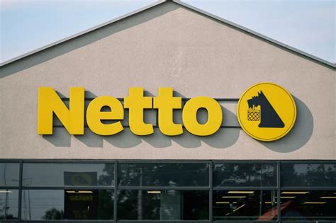 Logo sieci sklepów Netto z psem-symbolem oszczędzania