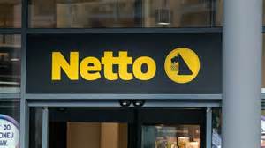 Logo sieci Netto z psem